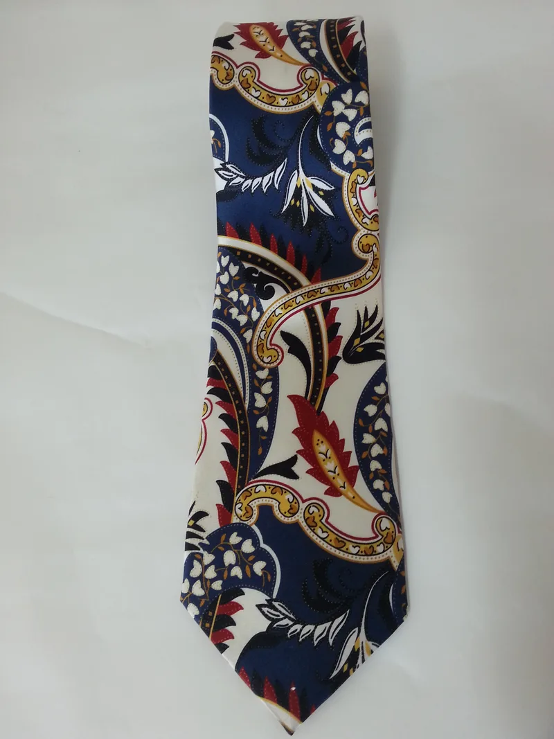 Cravate et pochette de costume en soie cachemire bleu