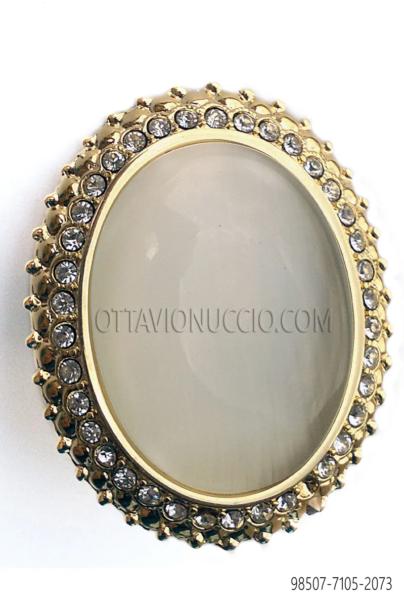 Broche de nudo dorado con camafeo crystal
