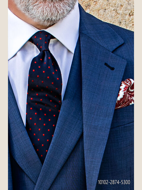 Cravatta in pura seta blu con pois rossi