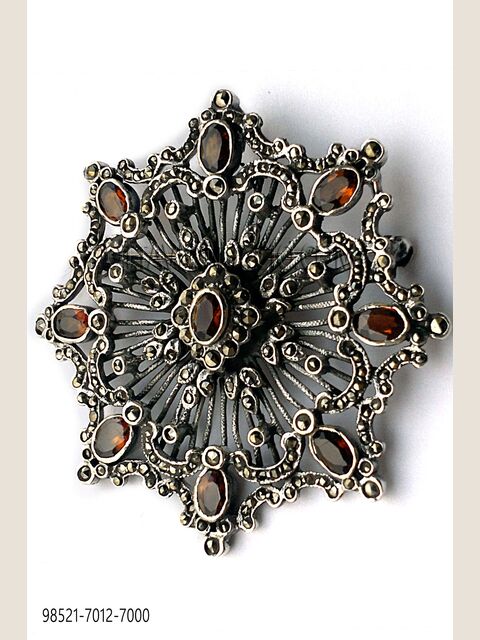 Spilla stella placcata in argento