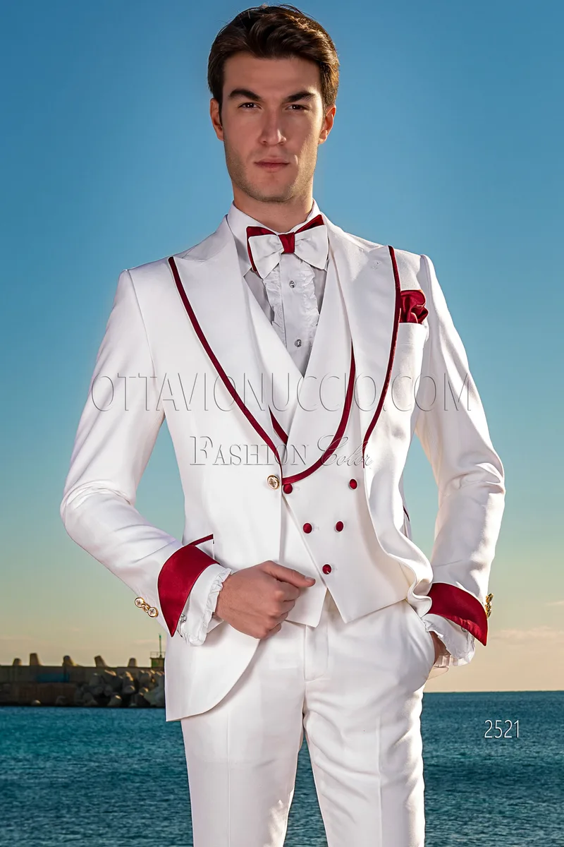 Abito uomo fashion su misura bianco, contrasti rosso sul rever e maniche 1