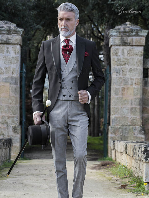 Vestito da sposo, giacca nera con pantalone e gilet principe di galles
