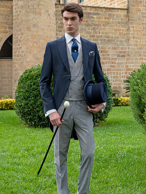 Tight sposo blu con gilet e pantalone principe di galles