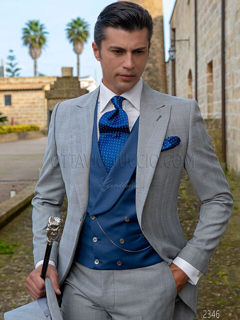Tight vestito sposo Principe di Galles e gilet blu elettrico