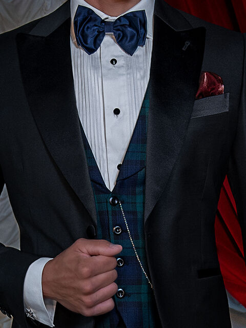 Gilet in tartan verde con collo sciallato