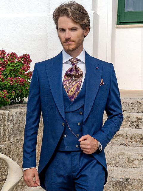 Tight da cerimonia con gilet doppiopetto in principe di galles blu